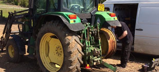 Tractor tyre being changed